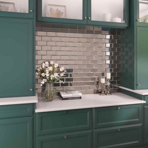 Custom antique mirror tiles installed on kitchen backsplash